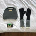 Detailed view of grey knitted handbag and color-block long gloves set for winter warmth. - 39x10cm / Black