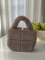 Brown teddy fleece handbag with trendy padded grid design, cozy plush texture and top handle detail. - Shrimp Pink