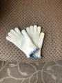 Women winter warm knitted touchscreen gloves with cute ruffle cuffs and embroidery details. - Ivory