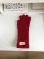 Detailed view of cozy red winter plush gloves on white surface, showing soft fuzzy texture. - 27X10CM-W207MD / Dark Red