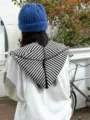 Detail view of the autumn winter knitted striped hood scarf and blue beanie hat for women warm - Black