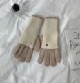 Detail view of stylish color block knit gloves, long design, warm and comfortable for winter. - 24x12cm-W205P / Off White