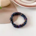 Herfst winter kleurrijke gevlekte pluche haarring met zwarte parel chic elastisch haarband - Zwart