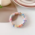 Kleurrijke pluche haarrekkers met donzig textuur, gezellige herfst-winter haarband voor vrouwen. - Broken Wit