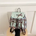 Zaino a quadri con stelle verde menta e fiocchi marroni, borsa casual elegante per donne. - Verde