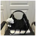 Black hobo shoulder bag detail, textured fabric, front zipper pockets and cute cloud charm. - Without Pendant / Black