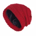 Red satin lined knit beanie hat detail view, soft slouchy winter warm headwear item. - Burgundy