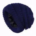 Detailed close-up view of dark blue cable knit beanie with smooth black satin inner lining. - Navy Blue