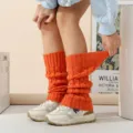 Cozy orange cable knit leg warmers for women, winter warm slouchy boot covers and knitted socks. - Orange