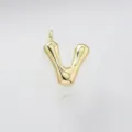 Close up detail of gold puffed letter V pendant, elegant shiny metallic finish charm. - Letter V / Pendant Only (Without Chain) / Gold