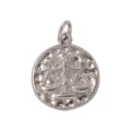 Detailed view of vintage silver Libra zodiac sign metal charm pendant with textured hammer design. - Libra