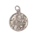 Detailed close-up of a vintage round silver zodiac Scorpio pendant charm for DIY necklaces. - Scorpio