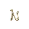 Close-up detail of the gold letter N pendant, featuring shiny 18k gold-plated brass and sparkling gem. - Letter N / Gold