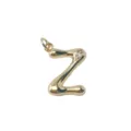 Detailed close-up of gold-plated letter Z pendant with sparkling crystal stone accent. - Letter Z / Gold
