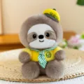 Cute plush sloth toy with yellow hat and green scarf, soft animal doll for desk decor. - Sloth