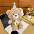 Brown cute plush teddy bear toy with blue party hat and yellow bow tie variant. - Warm Brown Bear - Yellow Bow Tie