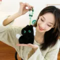 Cute plush toy pendant with green bead chain, soft animal keychain for bag decoration. - Pony Keychain - Black + Emerald Green Chain