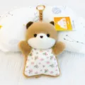 Cute plush bear keychain, soft stuffed animal doll pendant with floral apron for kids and gifts. - Beanbag Otter