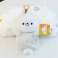 Cute plush seal animal doll keychain with floral outfit, soft stuffed bag charm. - Bean Bag Seal