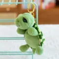 Green plush turtle keychain with gold metal ring, cute bag pendant and accessory. - Turtle