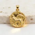 Close-up detail of vintage gold coin zodiac relief pendant, niche luxury gold-plated jewelry. - Aries
