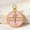 Detail shot of the round pink enamel zodiac pendant featuring sparkling cubic zirconia in gold-plated copper. - Style 7 (Pendants)