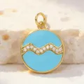 Detailed close-up view of a round blue enamel zodiac pendant with cubic zirconia inlay. - Style 9 (Pendants)