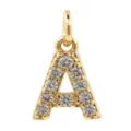 Detailed view of a gold plated letter A pendant paved with sparkling cubic zirconia stones. - Letter A
