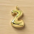 Detalle de colgante burbuja letra número abultado dorado, brillante joya de metal. - Letra Z / Dorado