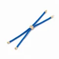 Cordon tresse bleu fil de Milan accessoire de bracelet reglable avec embouts metalliques et perle. - Bleu ciel