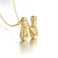 Gold plated puffy letter N pendant necklace, minimalist 18k gold initial chain detail. - Letter N