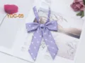 Dettaglio farfallino a pois viola, dolce accessorio uniforme JK, perfetto per outfit carini. - Viola chiaro
