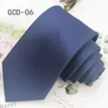 Solid navy blue polyester tie fabric detail shot, classic business formal wear accessory. - Navy Blue