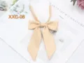Detail shot of a beige twill bow tie, perfect for JK uniforms and daily collar decoration. - Yellow