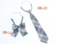 Blue plaid JK uniform tie and bow tie set detail view, featuring adjustable strap design. - Bow Tie / Size 8