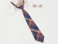 Detailed view of the pre-tied JK plaid necktie, classic blue and orange check pattern fabric. - TR-10