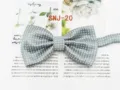 Detail view of grey polka dot men bow tie, elegant polyester silk accessory for formal wear. - SNJ-20