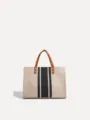 Bolso tote de lona para mujer con rayas verticales contrastantes y asas de cuero marrón. - Estilo con Cremallera / Negro y Blanco