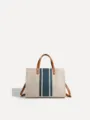 Bolso tote de lona minimalista para mujer con rayas azules y asas de cuero marrón. - Estilo con Cierre Magnético / Azul y Blanco