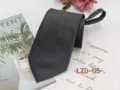 Detail shot of dark grey textured zipper necktie showing fabric quality and pre-tied design. - Dark Grey Striped (LZD-05)