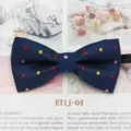 Children polka dot bow tie detail showing dark blue fabric with colorful dots and elastic strap. - Colorful Polka Dots