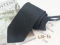 Close-up detail of black striped zipper tie, elegant business wear accessory flat lay. - Black Fine Striped (LZD-10)