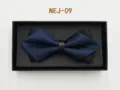 Detailed view of the layered blue and black bow tie inside a black gift box, elegant design. - Dark Blue and Black (NEJ-09)