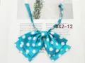 Detailed view of the blue polka dot bow tie for women's JK uniform sailor collar accessory. - Bright Blue(DX2-12)