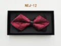 Detailed close-up of a burgundy plaid bow tie with black contrast layer in a gift box. - Red and Black Plaid (NEJ-12)