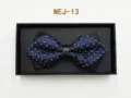 Blue and black plaid bow tie detail shot, elegant formal suit accessory in a black gift box. - Blue and Black Plaid (NEJ-13)