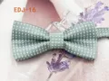 Detailed view of green polka dot children bow tie, elegant fabric texture and cute accessory. - EDJ-16 Black with White Dots