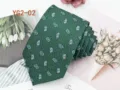 Detailed view of the green paisley jacquard necktie, featuring classic pattern and texture. - YG2-02