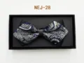 Detailed shot of a blue and silver patterned bow tie in a black gift box, elegant fabric. - Blue and Silver Traditional (NEJ-28)