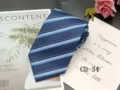 Detailed view of a classic blue striped men necktie, elegant jacquard fabric texture. - CD-34